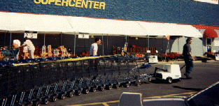 Cart Mule moving retail shopping carts at walmart.  